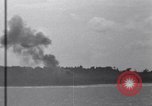 Standbild Bombardierung Peleliu Palau Inseln, 1944, aus Sekunde 18 historischem Filmmaterial Videoclip 65675034733