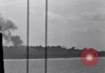 Standbild Bombardierung Peleliu Palau Inseln, 1944, aus Sekunde 23 historischem Filmmaterial Videoclip 65675034733