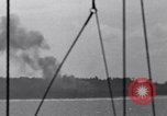 Standbild Bombardierung Peleliu Palau Inseln, 1944, aus Sekunde 32 historischem Filmmaterial Videoclip 65675034733