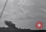 Standbild Bombardierung Peleliu Palau Inseln, 1944, aus Sekunde 46 historischem Filmmaterial Videoclip 65675034733