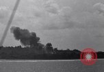 Standbild Bombardierung Peleliu Palau Inseln, 1944, aus Sekunde 54 historischem Filmmaterial Videoclip 65675034733