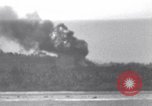 Standbild Bombardierung Peleliu Palau Inseln, 1944, aus Sekunde 55 historischem Filmmaterial Videoclip 65675034733