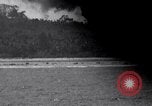 Standbild Bombardierung Peleliu Palau Inseln, 1944, aus Sekunde 59 historischem Filmmaterial Videoclip 65675034733