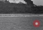 Standbild Bombardierung Peleliu Palau Inseln, 1944, aus Sekunde 60 historischem Filmmaterial Videoclip 65675034733
