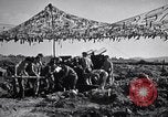 Image of U.S. Marine Battery firing 155mm howitzer Okinawa Ryukyu Islands, 1945, second 10 stock footage video 65675034734