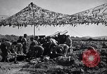 Image of U.S. Marine Battery firing 155mm howitzer Okinawa Ryukyu Islands, 1945, second 11 stock footage video 65675034734