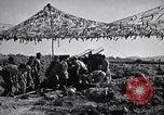 Image of U.S. Marine Battery firing 155mm howitzer Okinawa Ryukyu Islands, 1945, second 12 stock footage video 65675034734