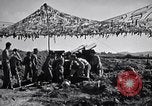 Image of U.S. Marine Battery firing 155mm howitzer Okinawa Ryukyu Islands, 1945, second 13 stock footage video 65675034734