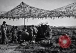 Image of U.S. Marine Battery firing 155mm howitzer Okinawa Ryukyu Islands, 1945, second 16 stock footage video 65675034734