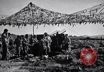 Image of U.S. Marine Battery firing 155mm howitzer Okinawa Ryukyu Islands, 1945, second 17 stock footage video 65675034734