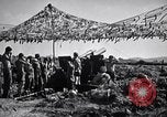Image of U.S. Marine Battery firing 155mm howitzer Okinawa Ryukyu Islands, 1945, second 26 stock footage video 65675034734