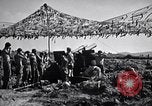 Image of U.S. Marine Battery firing 155mm howitzer Okinawa Ryukyu Islands, 1945, second 27 stock footage video 65675034734