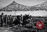 Image of U.S. Marine Battery firing 155mm howitzer Okinawa Ryukyu Islands, 1945, second 28 stock footage video 65675034734