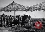 Image of U.S. Marine Battery firing 155mm howitzer Okinawa Ryukyu Islands, 1945, second 31 stock footage video 65675034734