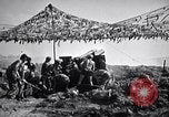 Image of U.S. Marine Battery firing 155mm howitzer Okinawa Ryukyu Islands, 1945, second 33 stock footage video 65675034734