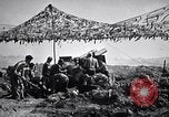 Image of U.S. Marine Battery firing 155mm howitzer Okinawa Ryukyu Islands, 1945, second 34 stock footage video 65675034734