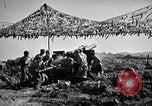 Image of U.S. Marine Battery firing 155mm howitzer Okinawa Ryukyu Islands, 1945, second 37 stock footage video 65675034734