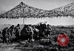 Image of U.S. Marine Battery firing 155mm howitzer Okinawa Ryukyu Islands, 1945, second 41 stock footage video 65675034734