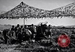 Image of U.S. Marine Battery firing 155mm howitzer Okinawa Ryukyu Islands, 1945, second 42 stock footage video 65675034734