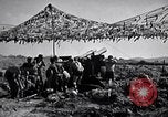 Image of U.S. Marine Battery firing 155mm howitzer Okinawa Ryukyu Islands, 1945, second 43 stock footage video 65675034734
