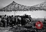 Image of U.S. Marine Battery firing 155mm howitzer Okinawa Ryukyu Islands, 1945, second 46 stock footage video 65675034734