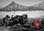 Image of U.S. Marine Battery firing 155mm howitzer Okinawa Ryukyu Islands, 1945, second 48 stock footage video 65675034734