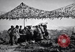 Image of U.S. Marine Battery firing 155mm howitzer Okinawa Ryukyu Islands, 1945, second 49 stock footage video 65675034734