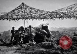 Image of U.S. Marine Battery firing 155mm howitzer Okinawa Ryukyu Islands, 1945, second 50 stock footage video 65675034734