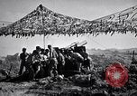Image of U.S. Marine Battery firing 155mm howitzer Okinawa Ryukyu Islands, 1945, second 51 stock footage video 65675034734