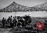 Image of U.S. Marine Battery firing 155mm howitzer Okinawa Ryukyu Islands, 1945, second 53 stock footage video 65675034734