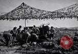 Image of U.S. Marine Battery firing 155mm howitzer Okinawa Ryukyu Islands, 1945, second 54 stock footage video 65675034734