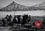 Image of U.S. Marine Battery firing 155mm howitzer Okinawa Ryukyu Islands, 1945, second 55 stock footage video 65675034734