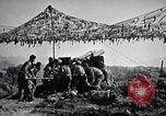 Image of U.S. Marine Battery firing 155mm howitzer Okinawa Ryukyu Islands, 1945, second 60 stock footage video 65675034734