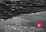Standbild Bombardierung Okinawa Ryukyu Inseln, 1945, aus Sekunde 19 historischem Filmmaterial Videoclip 65675034736