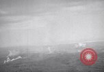 Standbild Bombardierung Okinawa Ryukyu Inseln, 1945, aus Sekunde 39 historischem Filmmaterial Videoclip 65675034736
