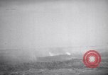 Standbild Bombardierung Okinawa Ryukyu Inseln, 1945, aus Sekunde 45 historischem Filmmaterial Videoclip 65675034736