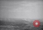 Standbild Bombardierung Okinawa Ryukyu Inseln, 1945, aus Sekunde 55 historischem Filmmaterial Videoclip 65675034736