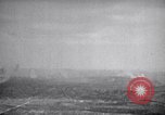 Standbild Bombardierung Okinawa Ryukyu Inseln, 1945, aus Sekunde 57 historischem Filmmaterial Videoclip 65675034736