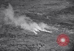 Standbild Bombardierung Shuri Okinawa Ryukyu Inseln, 1945, aus Sekunde 54 historischem Filmmaterial Videoclip 65675034737