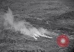 Standbild Bombardierung Shuri Okinawa Ryukyu Inseln, 1945, aus Sekunde 55 historischem Filmmaterial Videoclip 65675034737