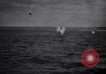 Image of Kamikaze attacks on US warships during World War II Pacific Ocean, 1945, second 24 stock footage video 65675034753