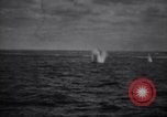 Image of Kamikaze attacks on US warships during World War II Pacific Ocean, 1945, second 25 stock footage video 65675034753
