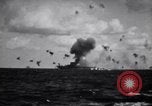 Image of Kamikaze aircraft attacks USS Saragora CV-3 Pacific Ocean, 1945, second 31 stock footage video 65675034754