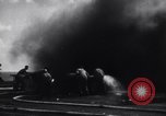 Image of Kamikaze aircraft attacks USS Saragora CV-3 Pacific Ocean, 1945, second 59 stock footage video 65675034754