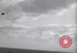 Image of Japanese kamikaze aircraft attacking US Navy ships Pacific Ocean, 1945, second 9 stock footage video 65675034755