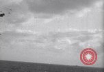 Image of Japanese kamikaze aircraft attacking US Navy ships Pacific Ocean, 1945, second 10 stock footage video 65675034755