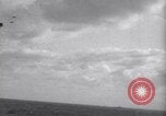 Image of Japanese kamikaze aircraft attacking US Navy ships Pacific Ocean, 1945, second 11 stock footage video 65675034755