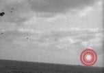 Image of Japanese kamikaze aircraft attacking US Navy ships Pacific Ocean, 1945, second 12 stock footage video 65675034755
