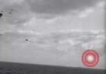 Image of Japanese kamikaze aircraft attacking US Navy ships Pacific Ocean, 1945, second 13 stock footage video 65675034755