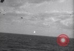 Image of Japanese kamikaze aircraft attacking US Navy ships Pacific Ocean, 1945, second 14 stock footage video 65675034755